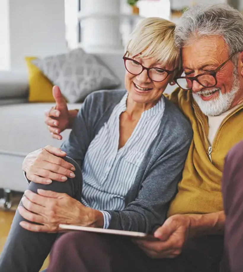 retired couple reading about annuities